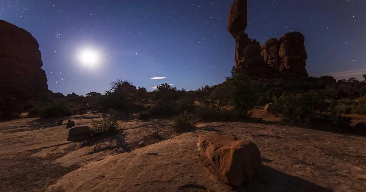 Scientists in laboratory conducting peptide research with modern equipment and molecular analysis tools